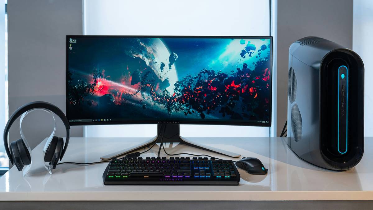Gaming PC part bundles including CPU, GPU, motherboard, RAM, and PSU neatly laid out on a desk